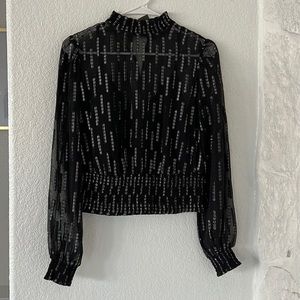 Express black and silver metallic smocked waist top.